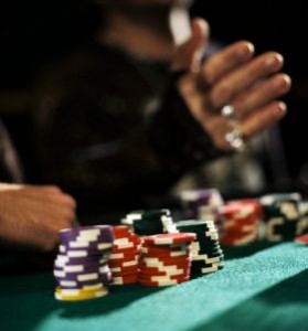 Chips on Table in Front of Poker Player