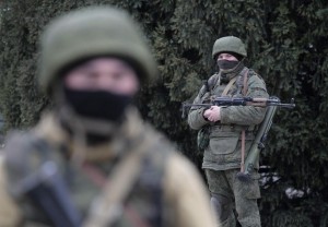 Armed men patrol in the center of the Crimean city of Simferopol