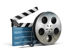 cinema clapper and film tape