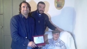 Il Consigliere Latella, il parroco don Piero e il festeggiato Don Limitri