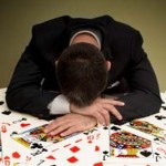 Businessman at Card Table