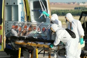 (FILES) A file handout picture taken and released on August 7, 2014 by the Spanish Defense Ministry shows Roman Catholic priest Miguel Pajares, who contracted the deadly Ebola virus, being transported from Madrid's Torrejon air base to the Carlos III hospital upon his arrival in Spain. A Spanish charity announced on August 11 a third member of its hospital in Liberia has died of Ebola, saying it believes a lack of basic safety precautions let the virus spread through its team. The charity's Ebola-struck hospital in the capital Monrovia has been shuttered, three of its personnel have now died and another, an elderly Spanish priest with Ebola, has been evacuated to Madrid for treatment.  AFP PHOTO / SPANISH DEFENSE MINISTRY / INAKI GOMEZRESTRICTED TO EDITORIAL USE - MANDATORY CREDIT "AFP PHOTO / SPANISH DEFENSE MINISTRY / INAKI GOMEZ" NO MARKETING NO ADVERTISING CAMPAIGNS - DISTRIBUTED AS A SERVICE TO CLIENTS