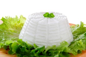 Ricotta cheese on green salad