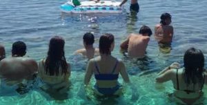 parroco messa in mare