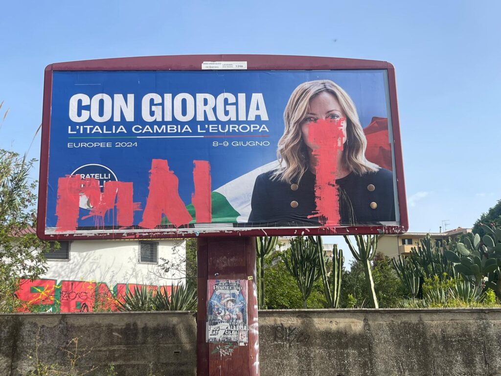 manifesti imbrattati meloni reggio