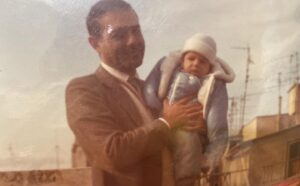 giuseppe falcomatà in braccio al padre Italo