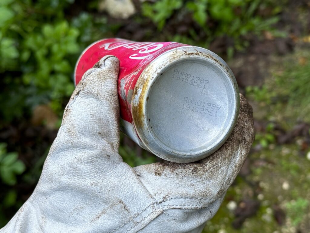 Lattina Coca-Cola rifiuti