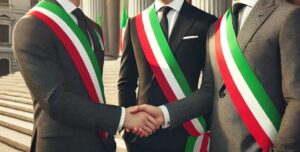sindaci a confronto si stringono la mano