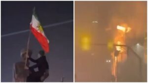 Proteste Iran bandiera Scià fuoco edifici Guardie