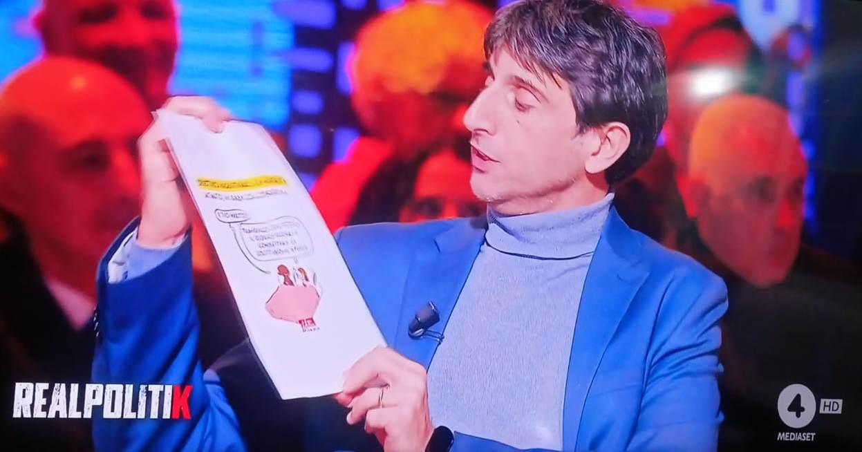donzelli mostra vignette volgari contro giorgia meloni a real politik su rete 4