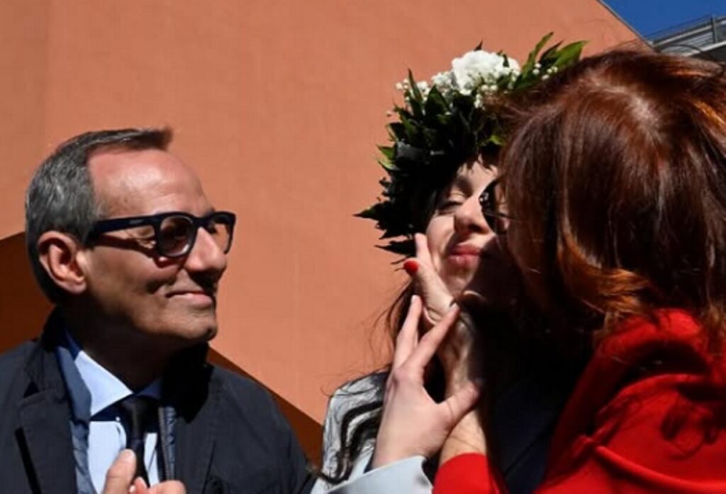 Battaglia e la figlia che si laurea