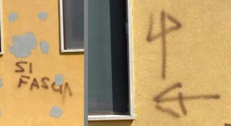 scritte muro pisa cappotto termico scambiate per simboli fascisti