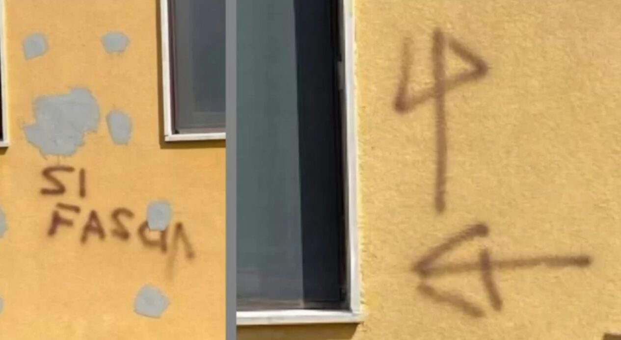 scritte muro pisa cappotto termico scambiate per simboli fascisti